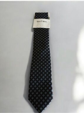 Goodfellow & Co brown necktie with a blue square geometric pattern.